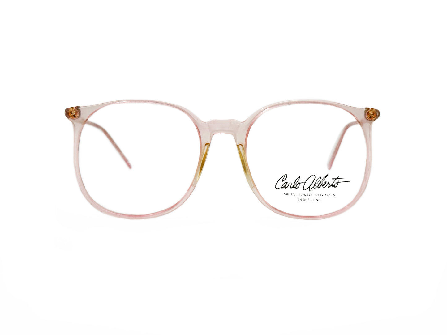 Carlo Alberts oversized, round optical frame. Model: Joe. Color: 1199- Transparent Pink. Front view.