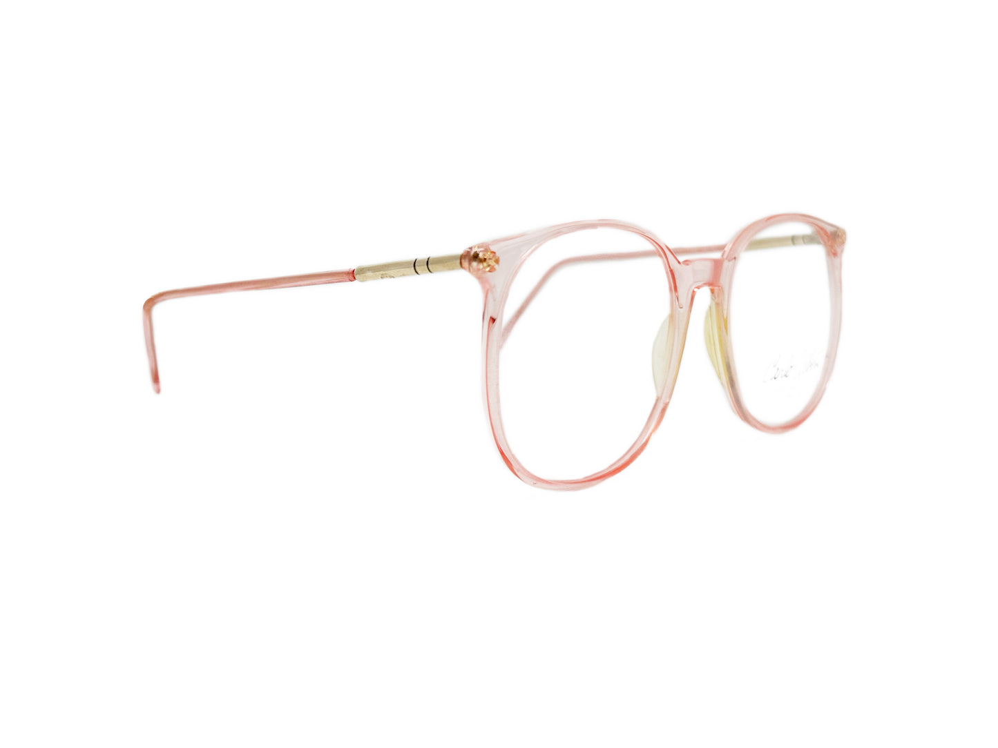 Carlo Alberts oversized, round optical frame. Model: Joe. Color: 1199- Transparent Pink. Side view.