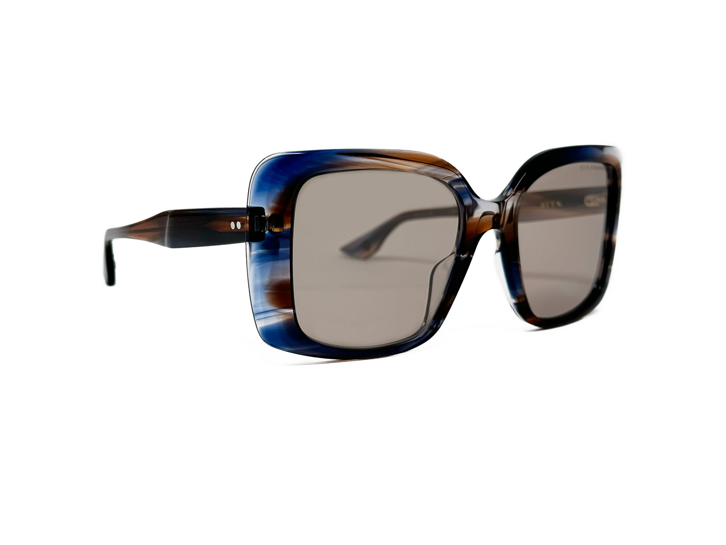 Dita large, rounded-square, acetate sunglass. Model: Adabrah. Color: 02 - Brown/blue/transparent swirl with light brown lenses. Side view.