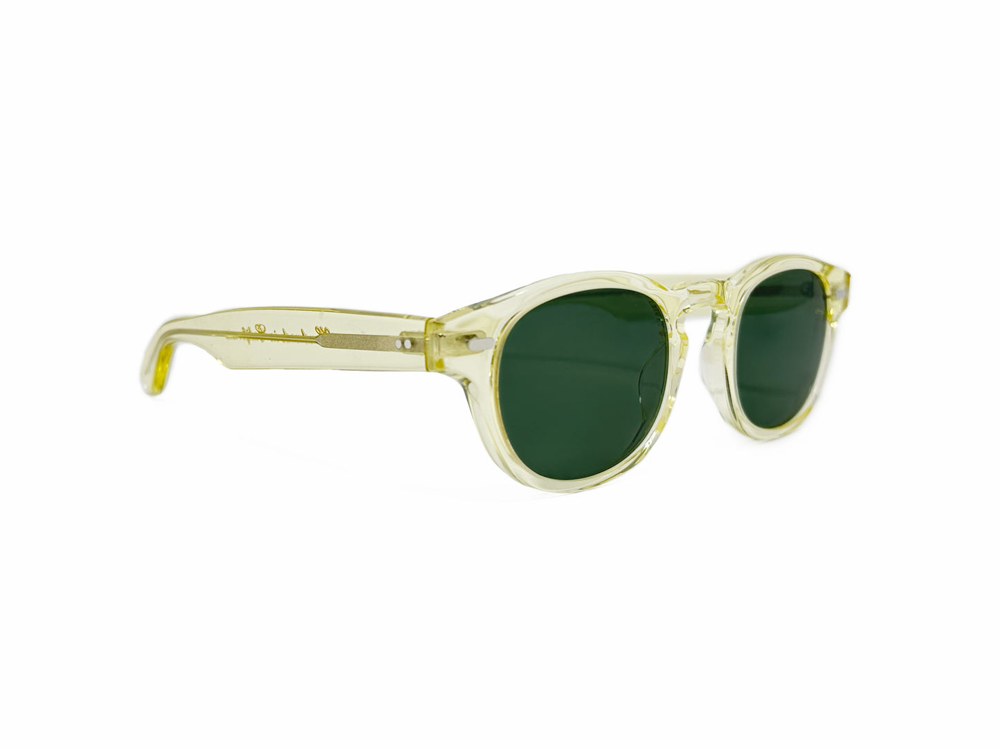 Kala Eyewear rounded acetate sunglass. Model: Kalifornia. Color: CHP - Transparent with a hint of yellow. Side view.