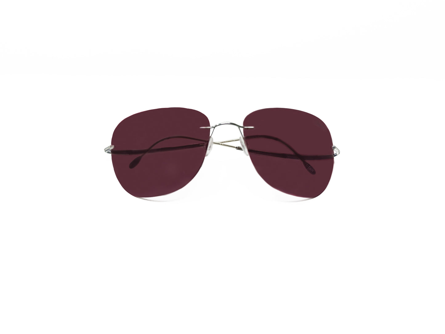 Silhouette rimless sunglass with rose lens. Model: 7499. Color: 6050- Silver with rose lens. Front view.
