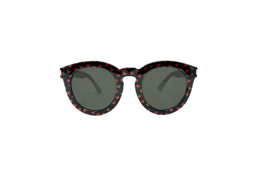 Saint Laurent round acetate sunglass with keyhole bridge. Model: SL102. Color: 005 - Black with red hearts. Front view. 