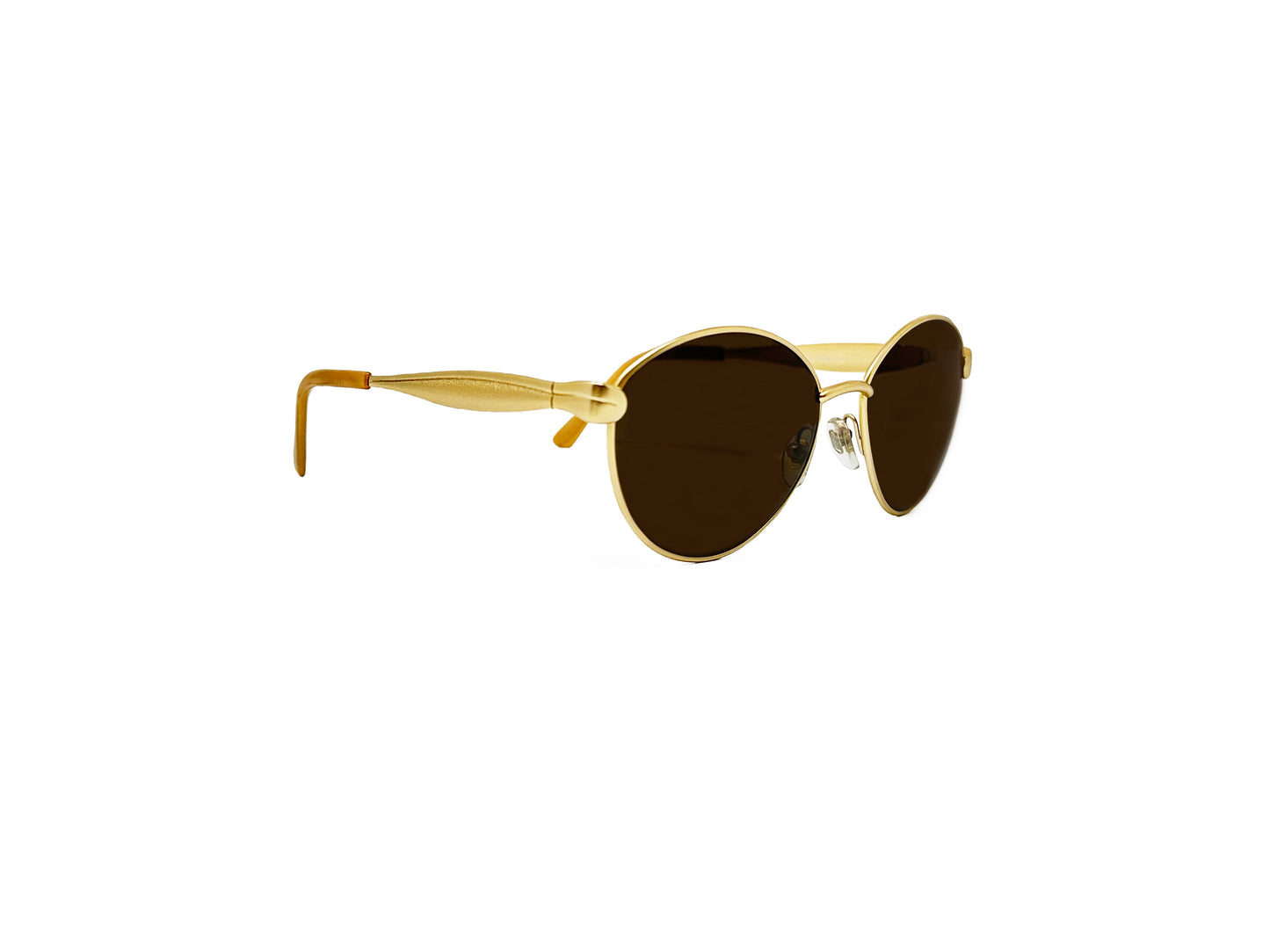 Ted Lapidus uplifted, rounded sunglass with gold metal frame. Model: TL36. Color: E038. Side view.