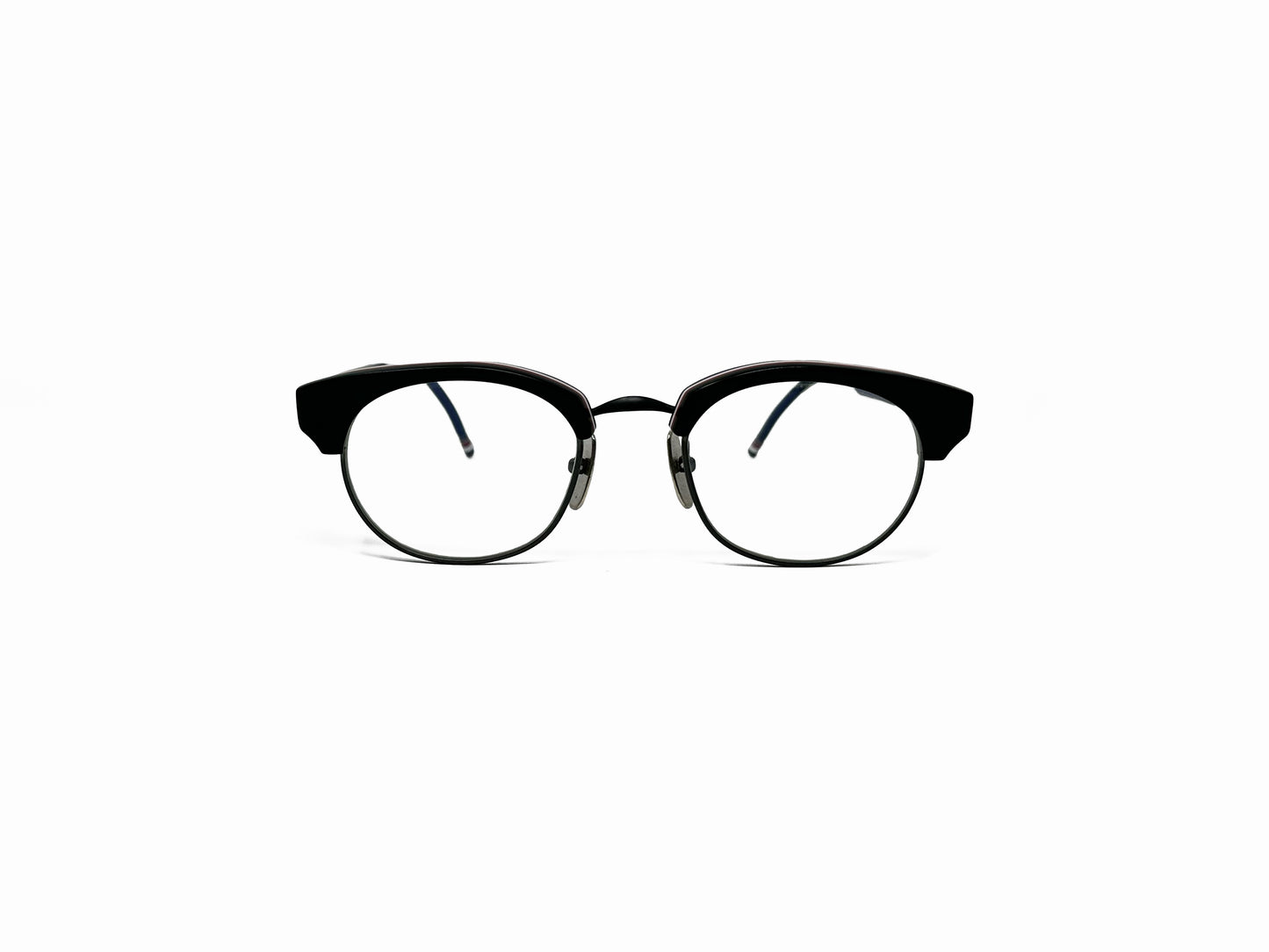 Thom Browne rounded half-rim optical frame. Model: 702. Color: Black with silver metal nose pads. Front view.