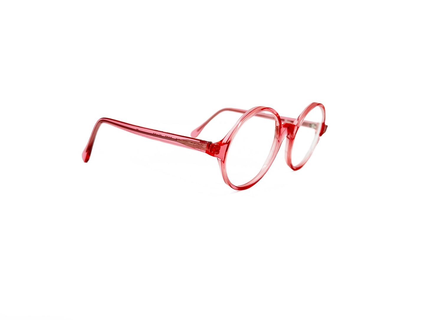 Viktlos round acetate optical frame. Model: 2515. Color: Transparent starburst pink. Side view.