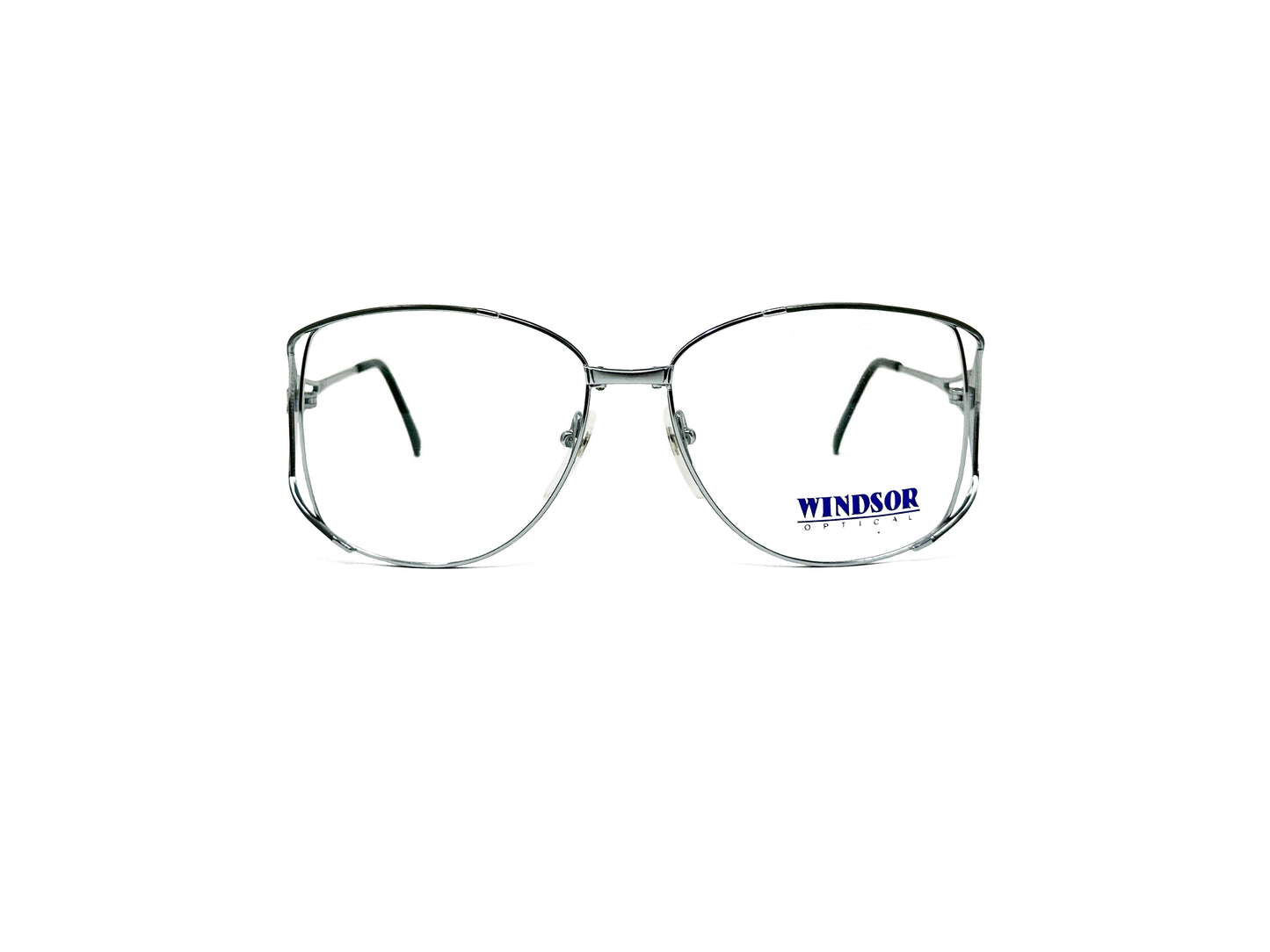 Windsor Optical metal butterfly optical frame. Curved top and bottom with straighter sides and wire cut-outModel: Tetra. Color: GR- Silver. Front view.