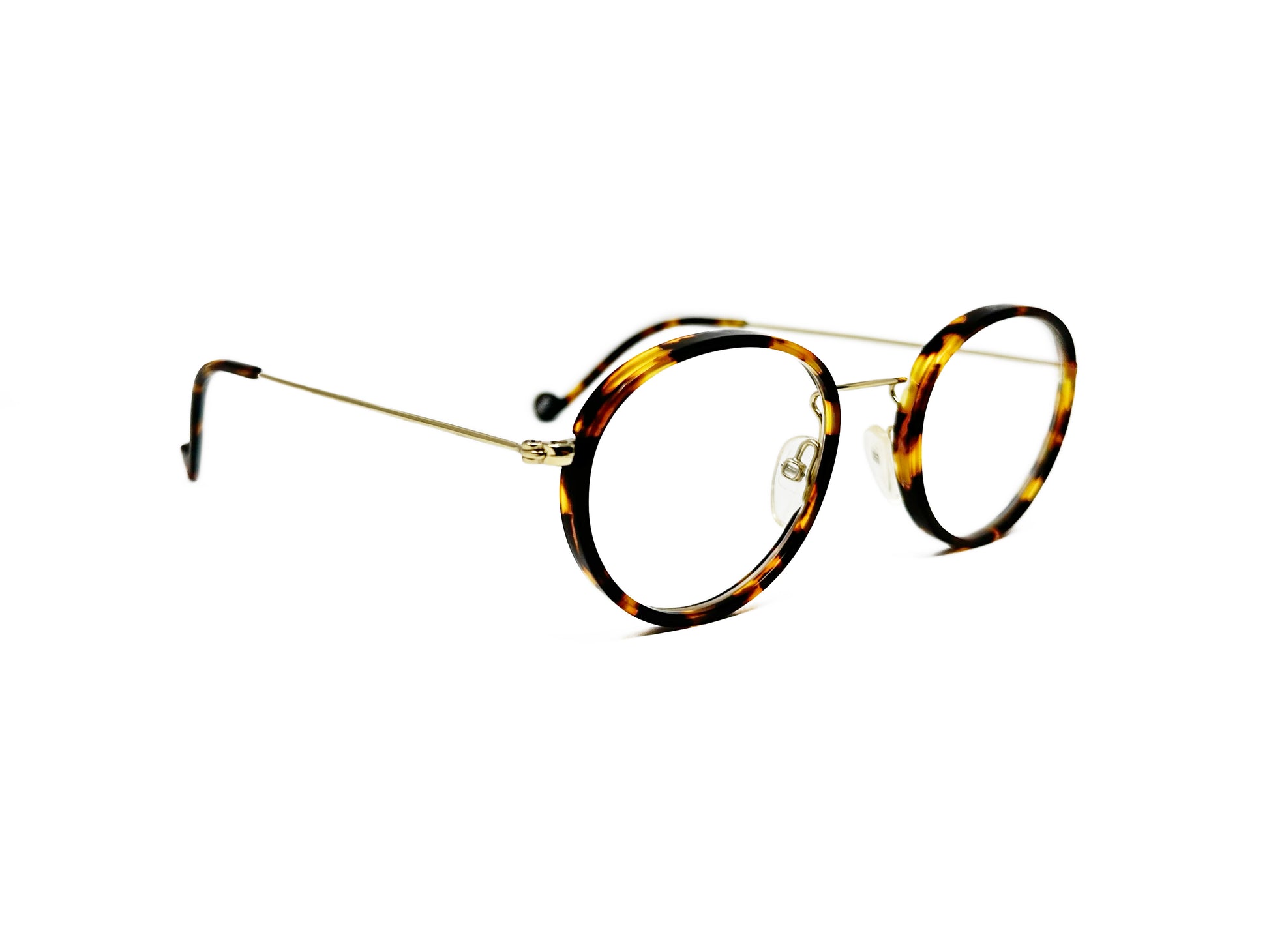 XIT pantos optical frame. Acetate lining on front with metal temples. Model: M151. Color: 133 - Tortoise with gold metal. Side view.