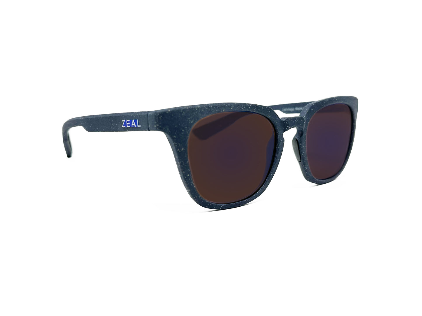 Zeal Optics tall, wayfarer style, polarized sunglass with keyhole bridge. Model: Calistoga. Color: 12027 - Navy blue with white speckles. Side view.