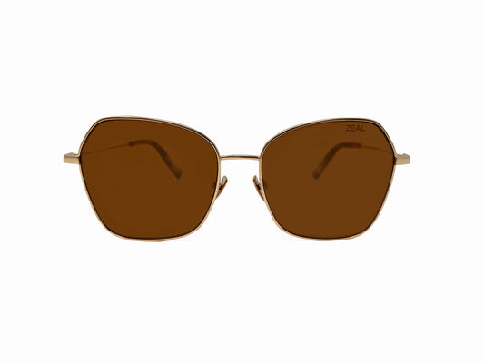 Zeal Optics metal butterfly shaped polarized sunglass. Model: Fillmore. Color: 12716 - Gold with brown lens. Front view. 