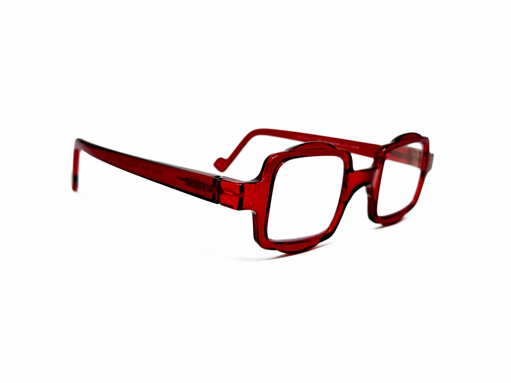 Aptica square reading glass with half-circle shape on top and bottom . Model: Hive. Color: Royal Red - Semi-transparent. Side view.