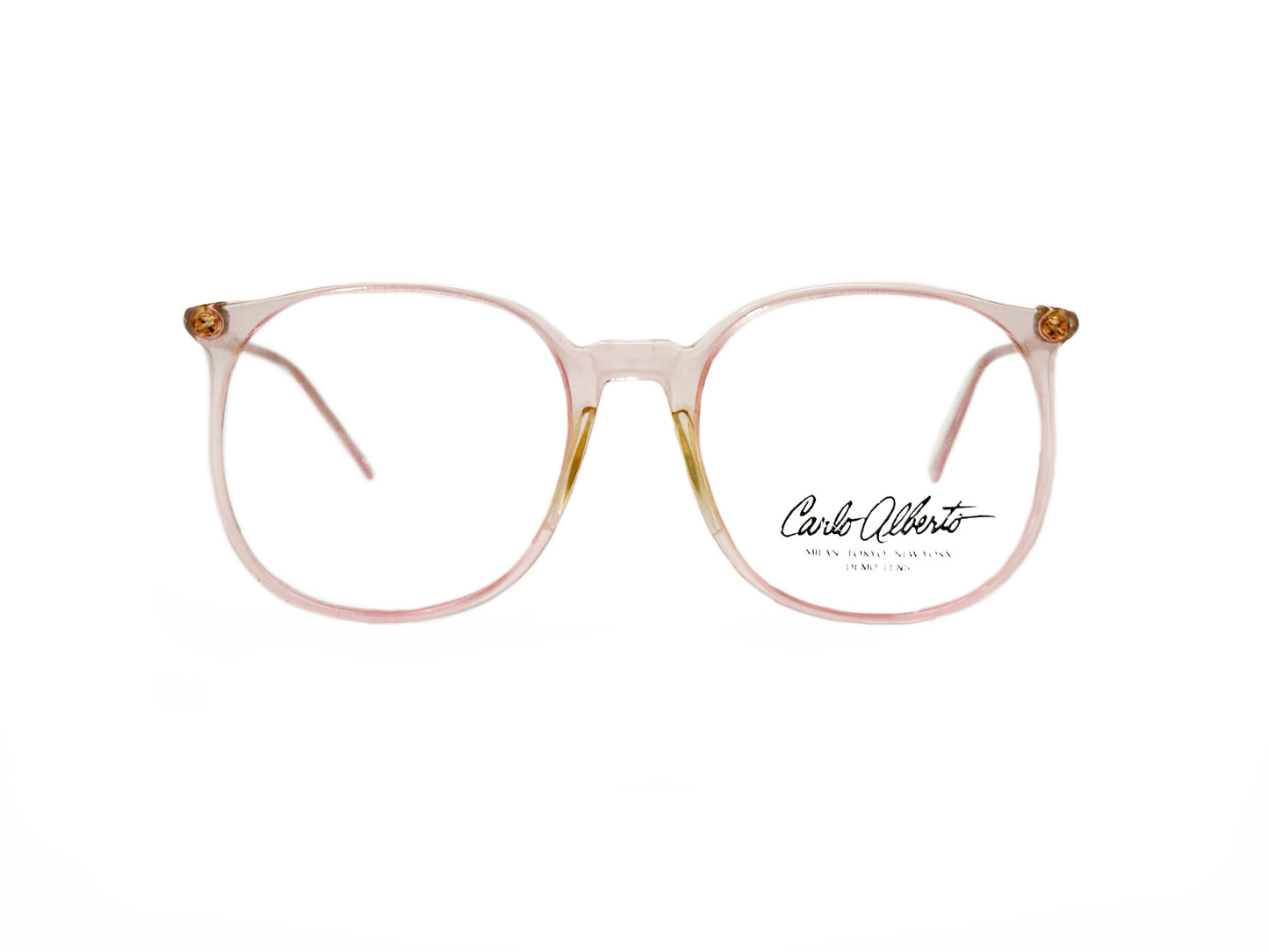 Carlo Alberts oversized, round optical frame. Model: Joe. Color: 1199- Transparent Pink. Front view. 