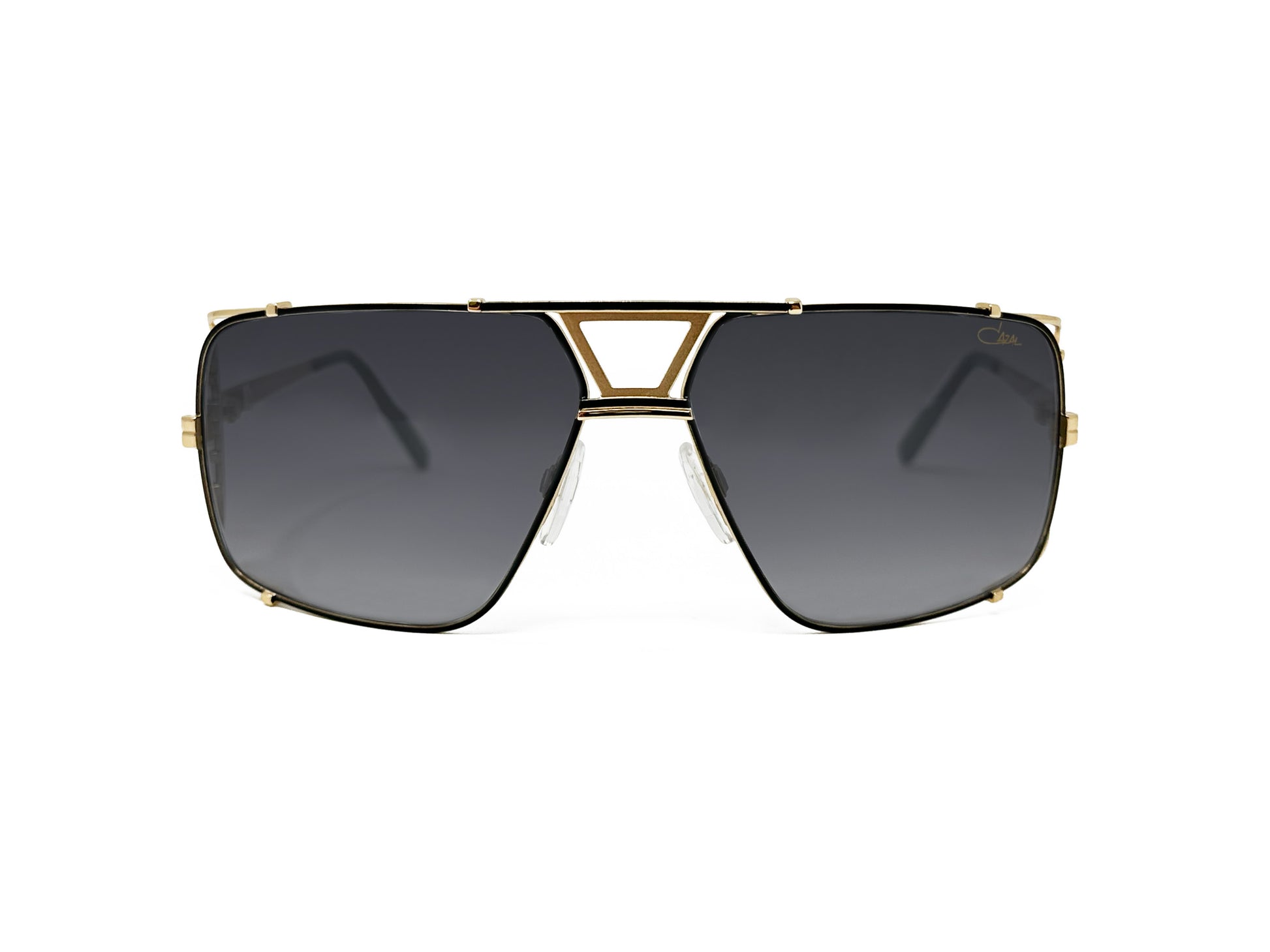 Cazal large, square, aviator type sunglass with triangular cutout above nose bridge. Model: 9093. Color: 005. Front view.