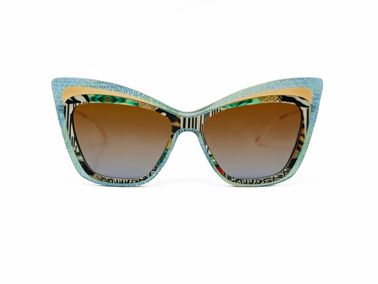 Christian Roth acetate cat-eye sunglasses. Model: Rock 'n Roth. Color: Blu - Blue tile pattern, yellow, and animal print. Front view. 