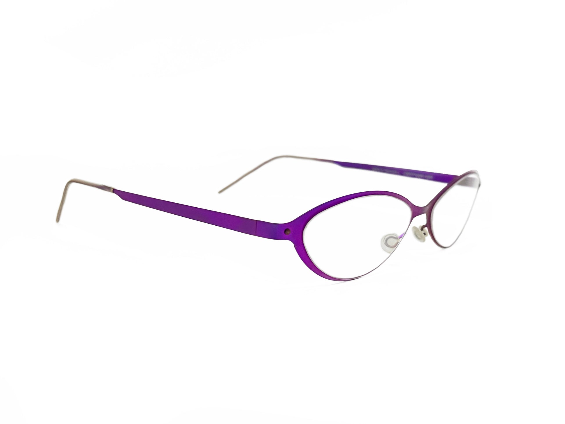 Copenhagen Eyes angled-oval, metal, optical frames. Model: It's Total. Color: 57 - purples. Side view.