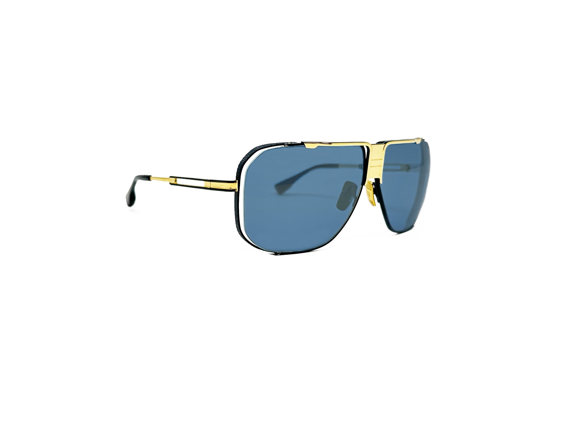Dita large angled, aviator type sunglass with flat top. Model: Cascais. Color: Gold metal with blue lenses. Side view.