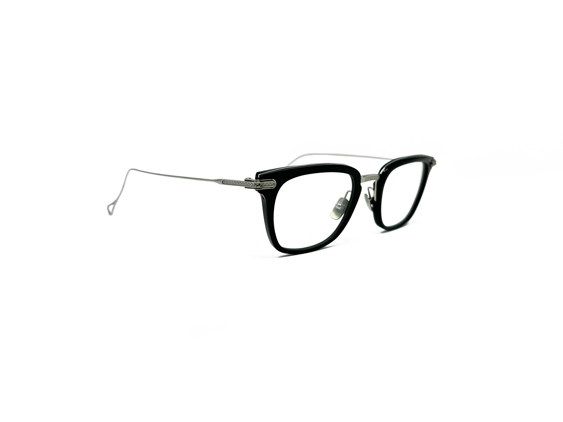 Dita optical frame. Black acetate with silver metal temples. Model: DRX2066 Stateside. Color: TRT-BLK, black acetate front with silver wire temples. Side view.