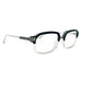 Dita square optical frame, acetate front with wire temples. Front of the frame is black on top and transparent on bottom. Model: Lexington. Color: C - Black and clear. Side view.