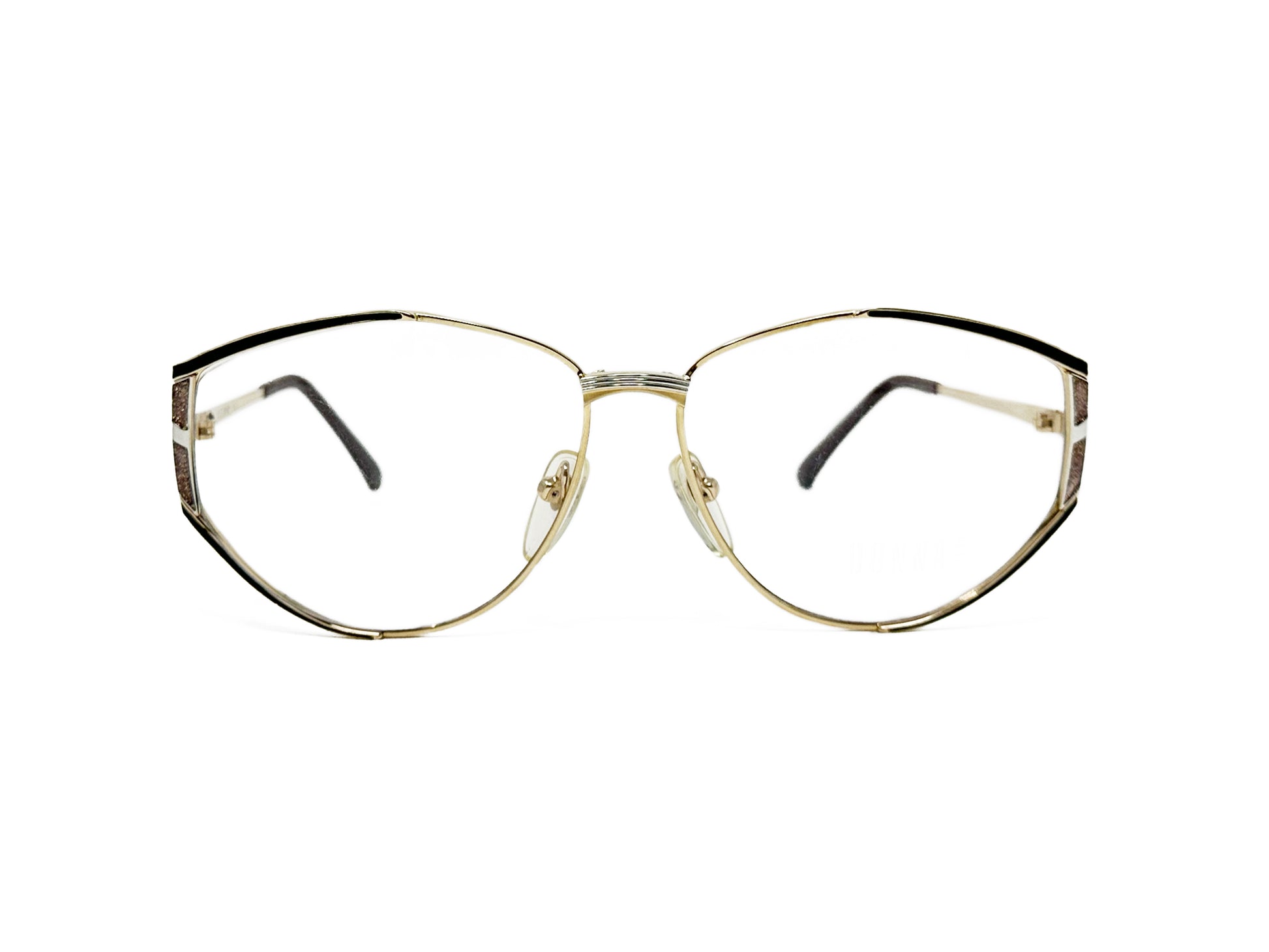 Donna House oversized, angular, metal optical frame with rounded bottom. Model: 4001. Color: 01 - Light Gold with black corners and silver metal accents. Front view. 