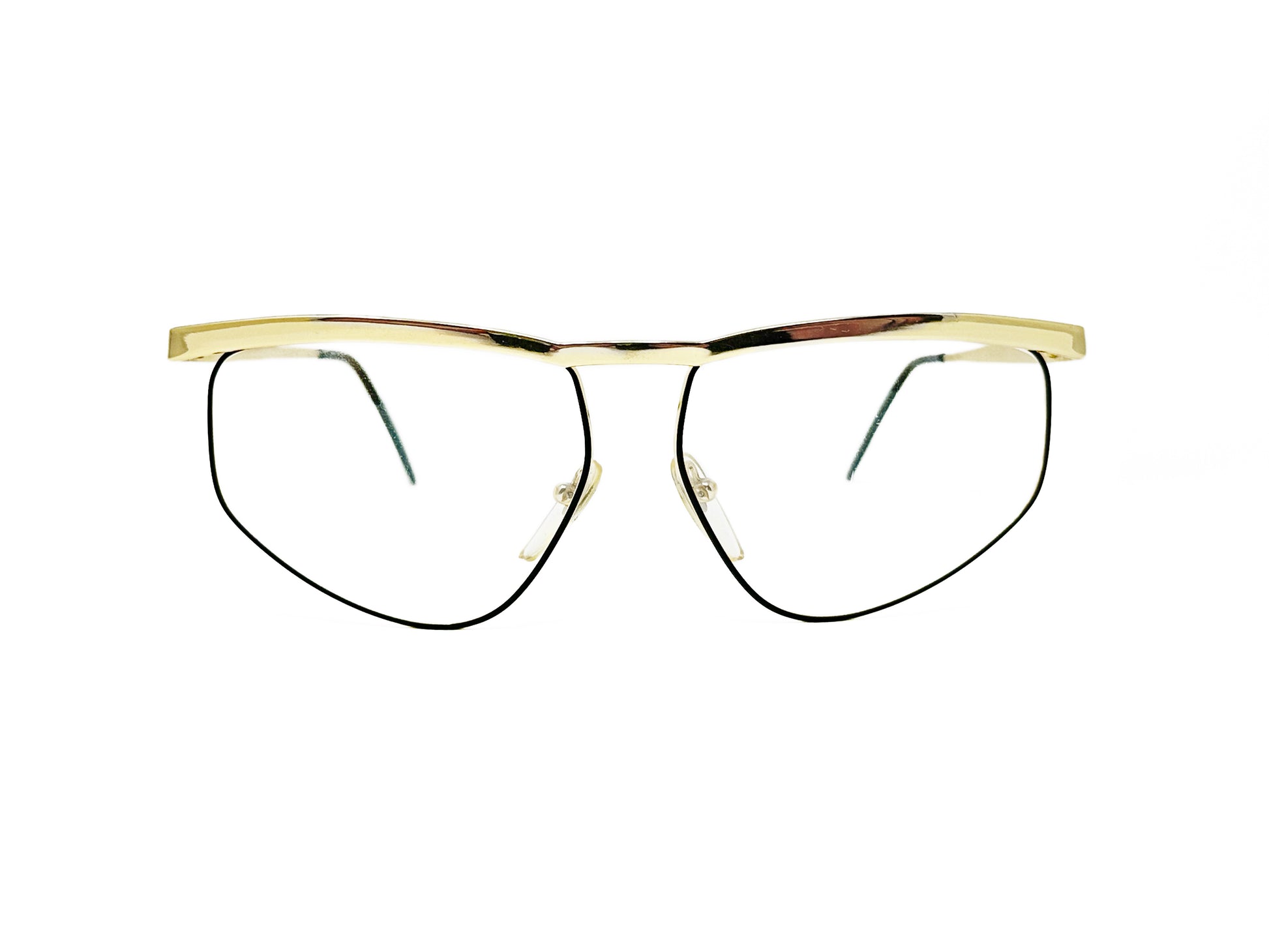 Essence large, geometric, half-rim optical frame with slight flat-top. Model: 01. Color: Gold. Front view.
