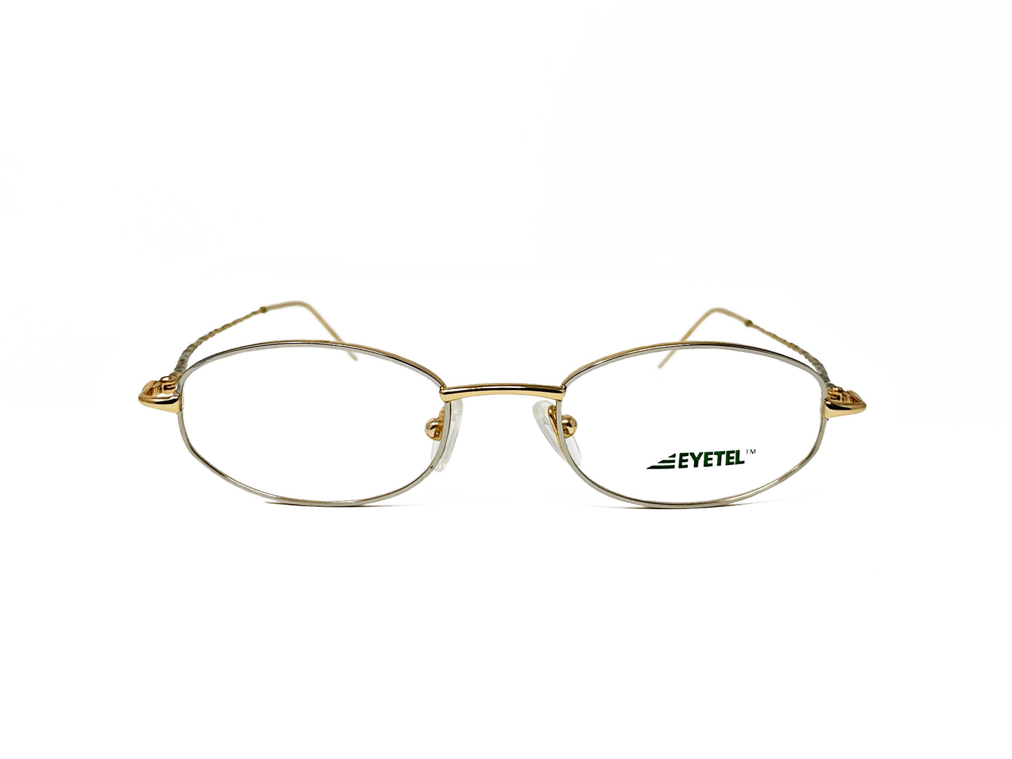 Eyetel oval, with slight angles, metal optical frame. Model: Bach. Color: 425 - White gold. Front view. 