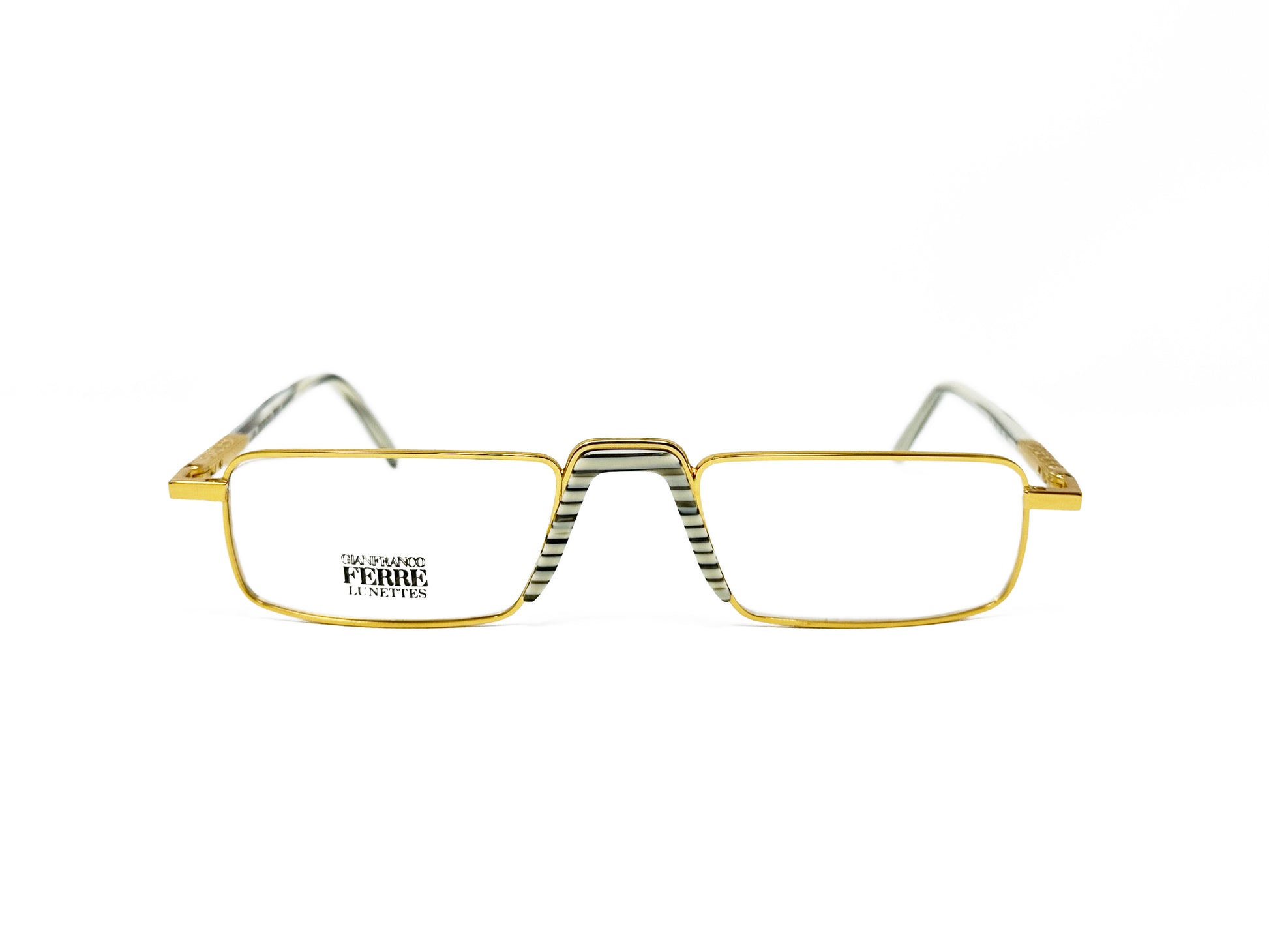 Ferre metal, low profile with raised bridge optical frame. Model: GFF362. Color: 032 - Gold metal with white/black striped nose piece. Front view. 