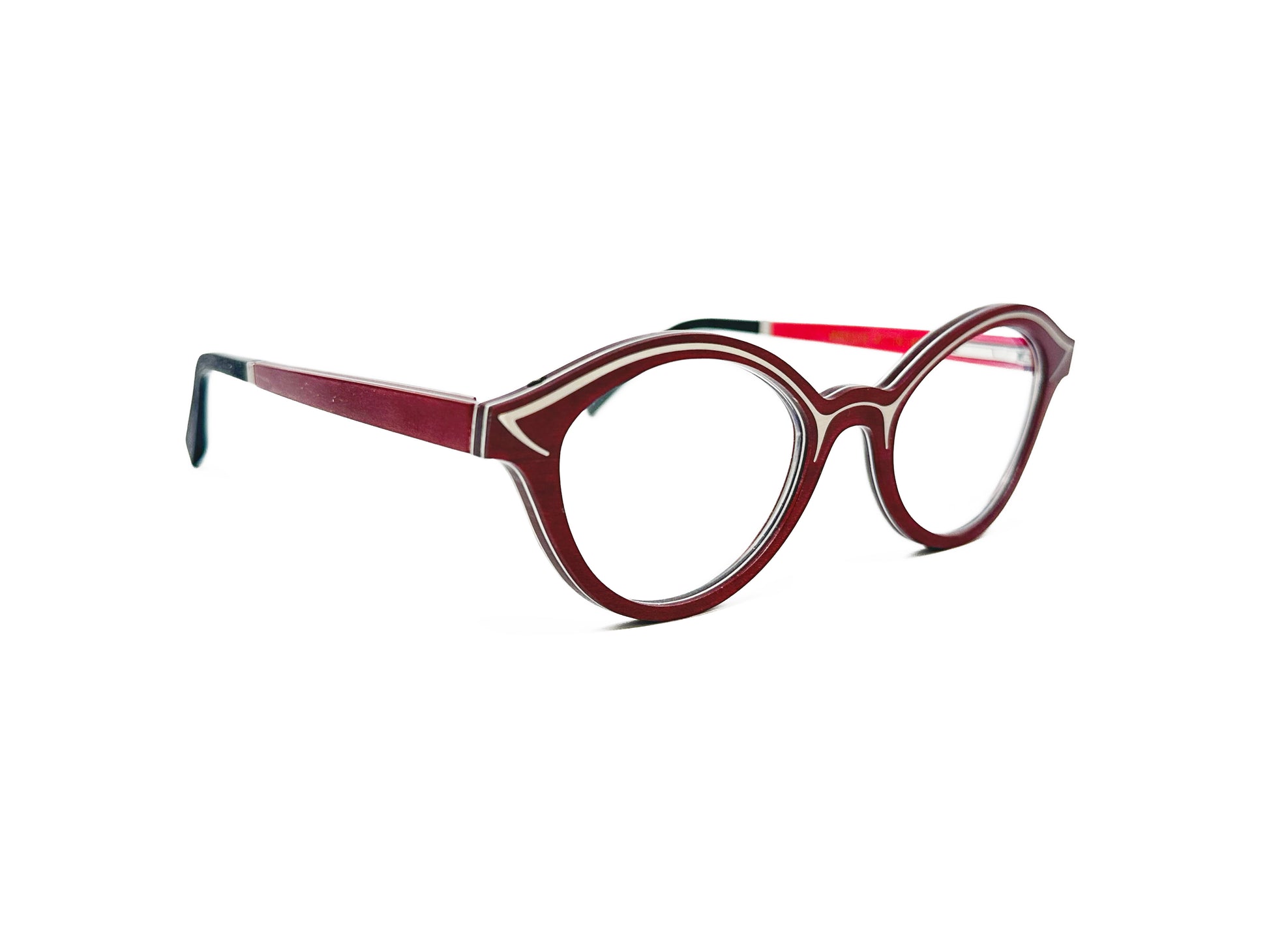 Gold & Wood rounded cat-eye optical frame made out of wood. Model: Mya. Color: Red with cream lining on top of frame. Side view.