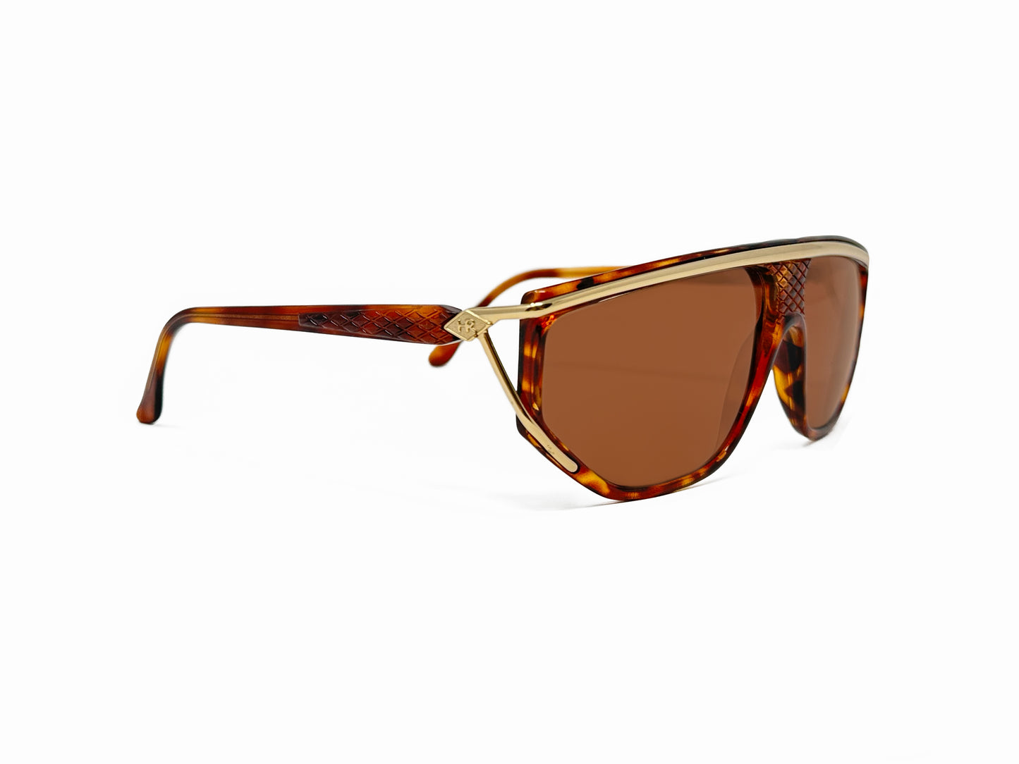 Helena Rubenstein rectangular, geometric, acetate sunglasses with a curved flattop. Model: HR201. Color: 4020 - Tortoise with gold metal accent across top of frame. Side view.
