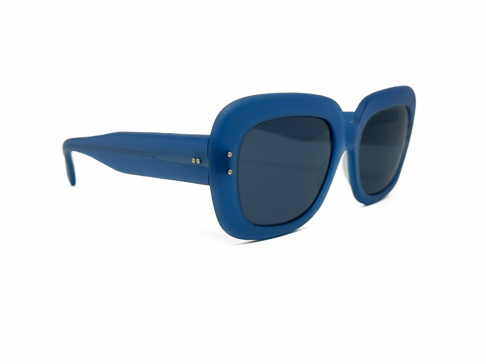 Kador rounded -square, plastic sunglasses. Model: M/1654. Color: Blue. Side view.
