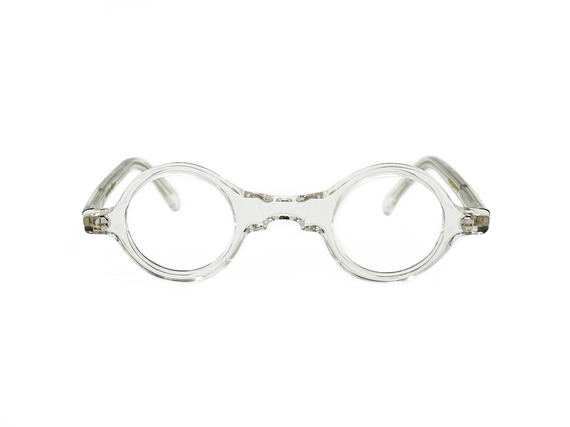 Kala round, transparent acetate optical frame with keyhole style bridge. Model: Dot. Color: CLR - clear. Front view.