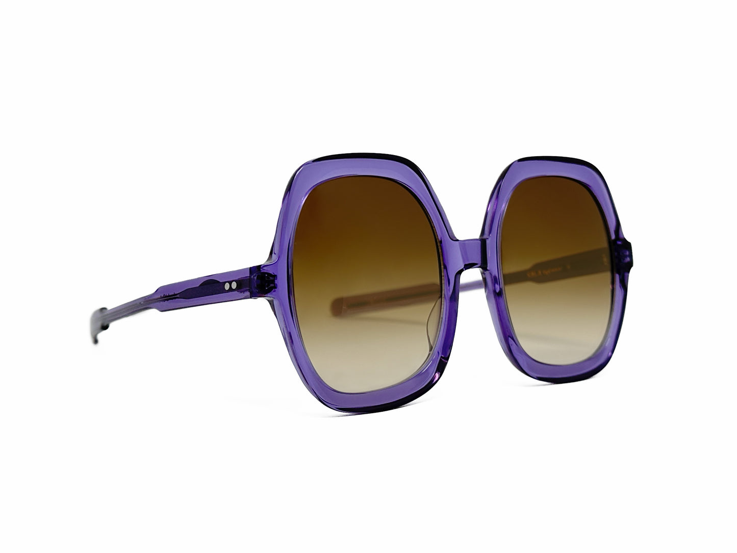 Kala Eyewear large, oval, acetate sunglass. Model: Twiggy. Color: PUC - Transparent Purple. Side view.