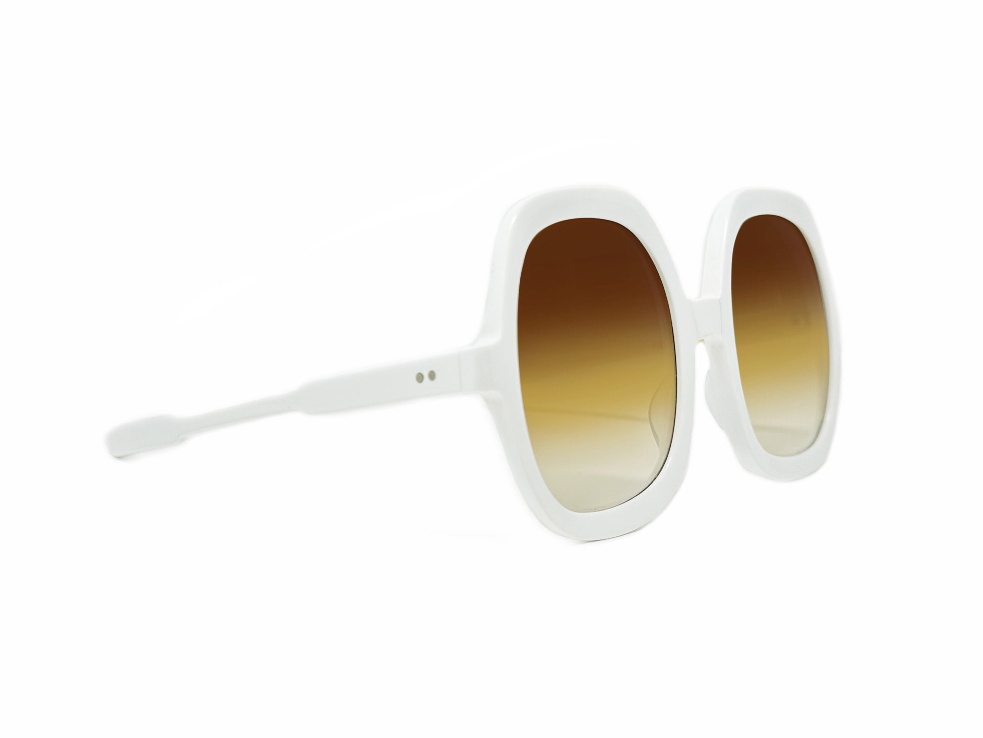 Kala Eyewear large, oval, acetate sunglass. Model: Twiggy. Color: WH white. Side view.