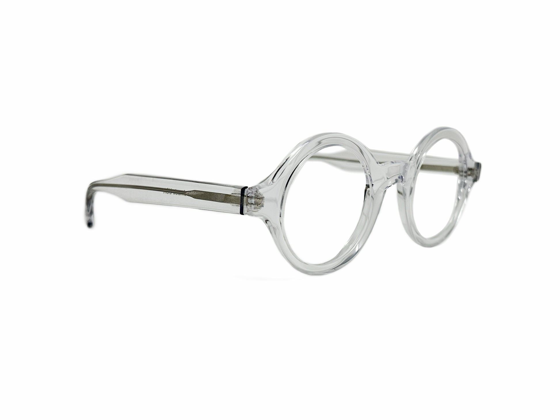 Kala Eyewear round acetate optical glasses. Model: Washer. Color: CLR - Transparent. Side view.