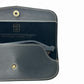 Inside of black leather snap case with Optique America logo