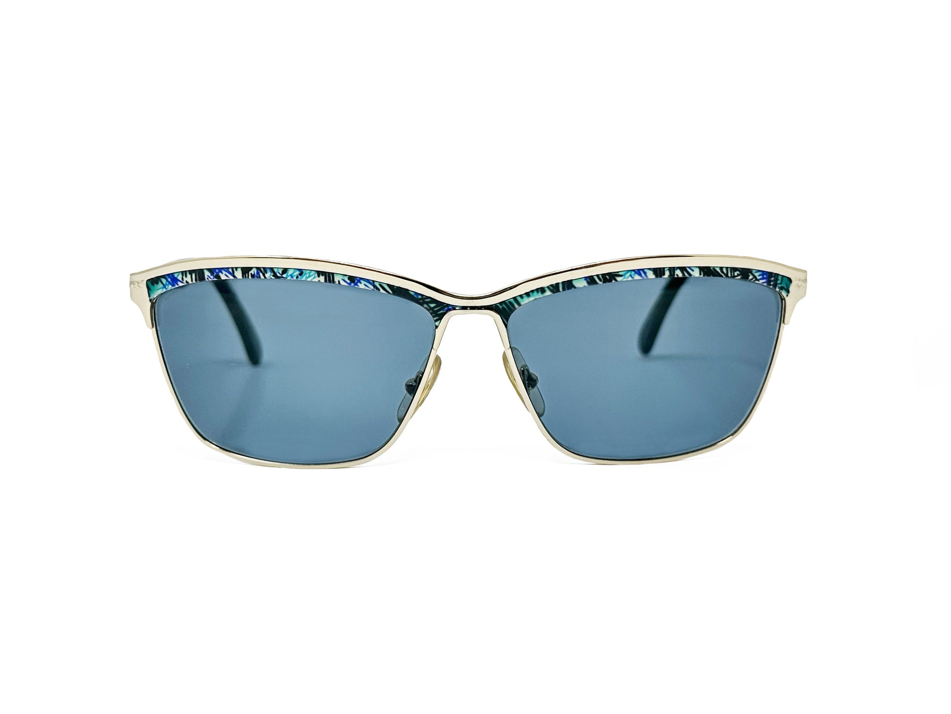 Luara Biagotti rectangular, slight cat-eye sunglass. Model: LB688/S. Color: RT7 - Gold metal with blue patterned trim at top. Front view.