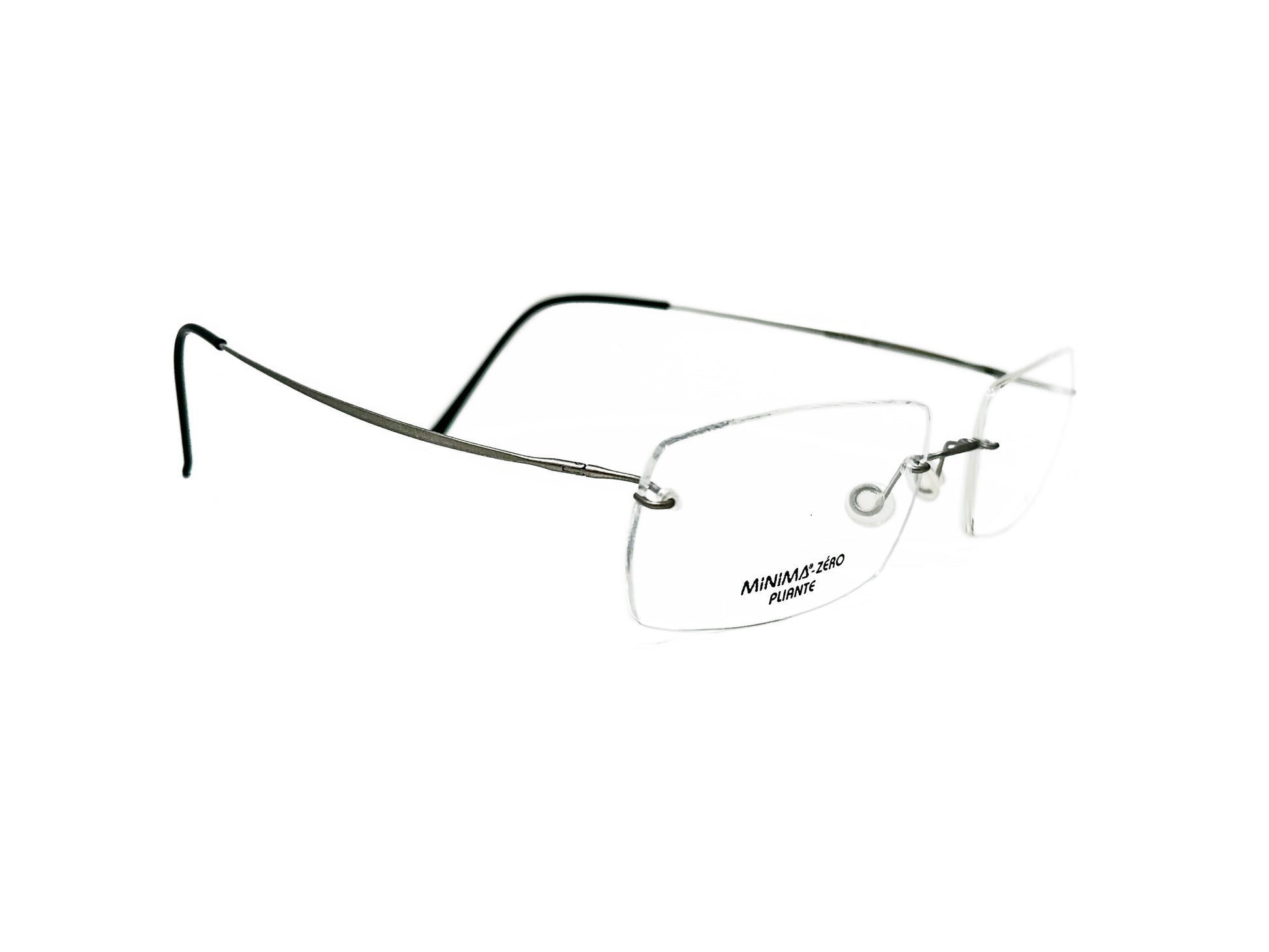 MInima rectangular, titanium, rimless, optical frame with thin curbed temples. Model: 868. Color: 79 - Silver. Side view.