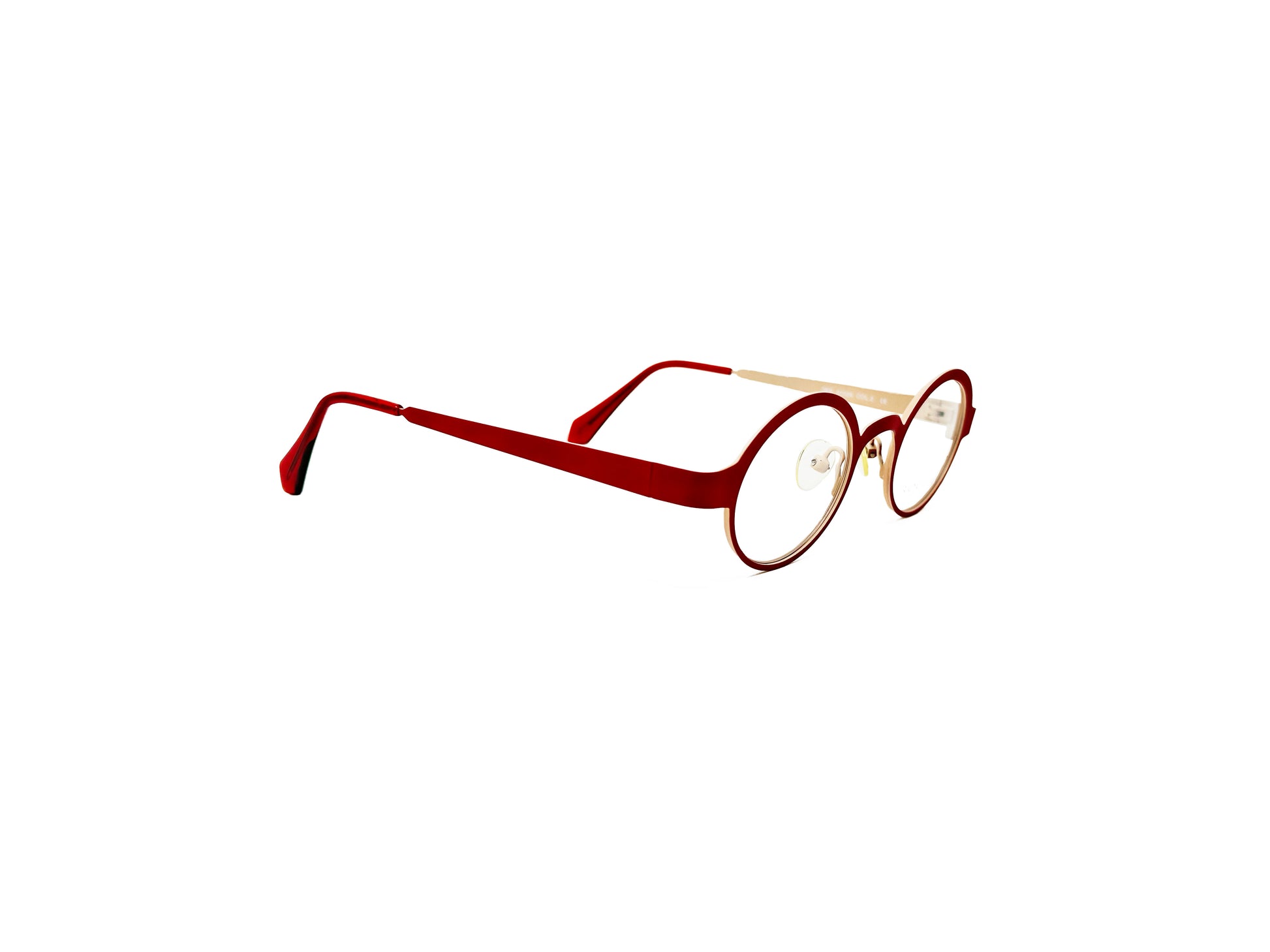 Roger oval, metal, optical frames . Model: Dee. Color: 2 Red and cream. Side view.