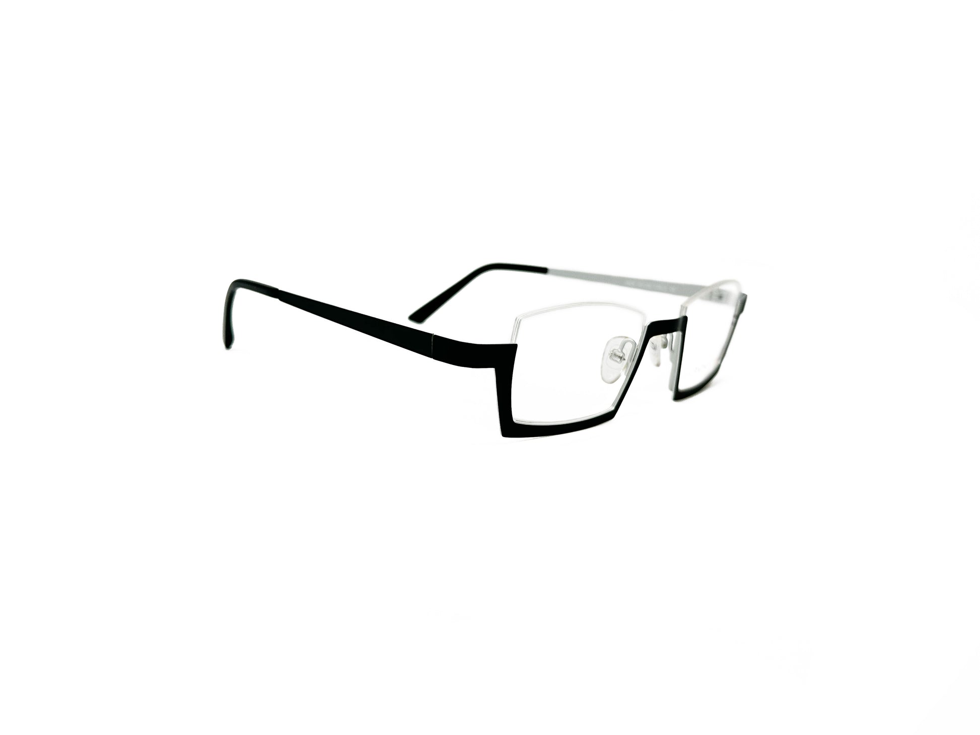 Roger angled, metal half-rim optical frame with metal rim on bottom and bare on top. Model: Jack. Color: 2 - Black with Silver. Side view.