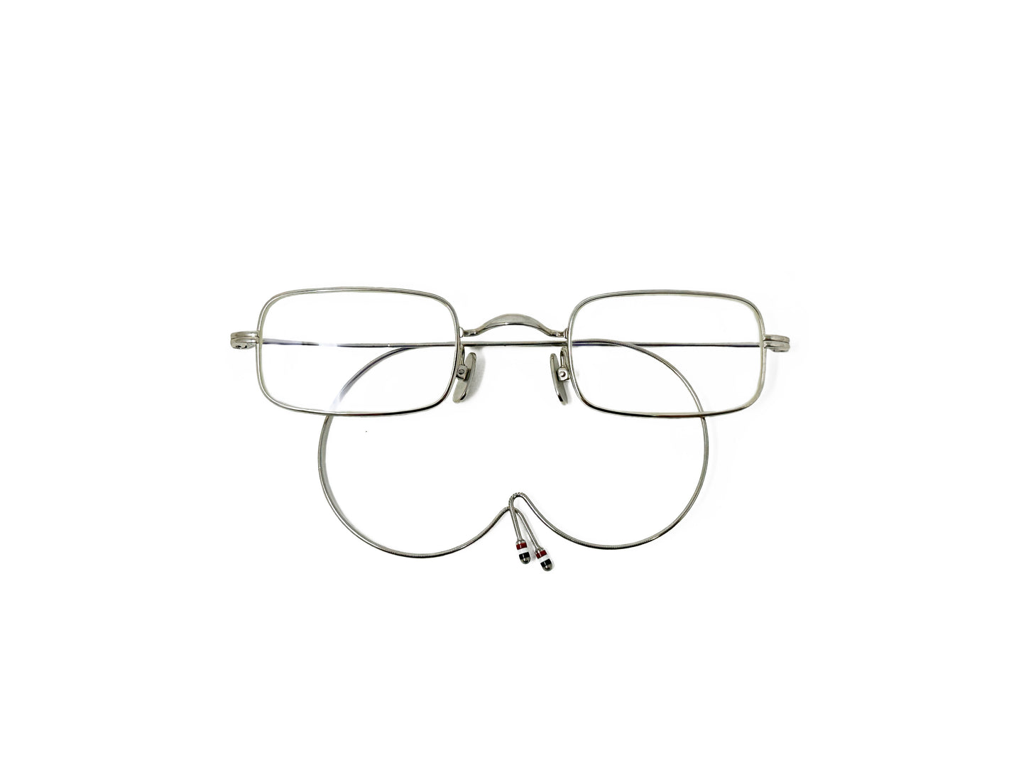 Thom Brown rectangular metal optical frame with cable temples. Model: TB900. Color: Silver. Front view.