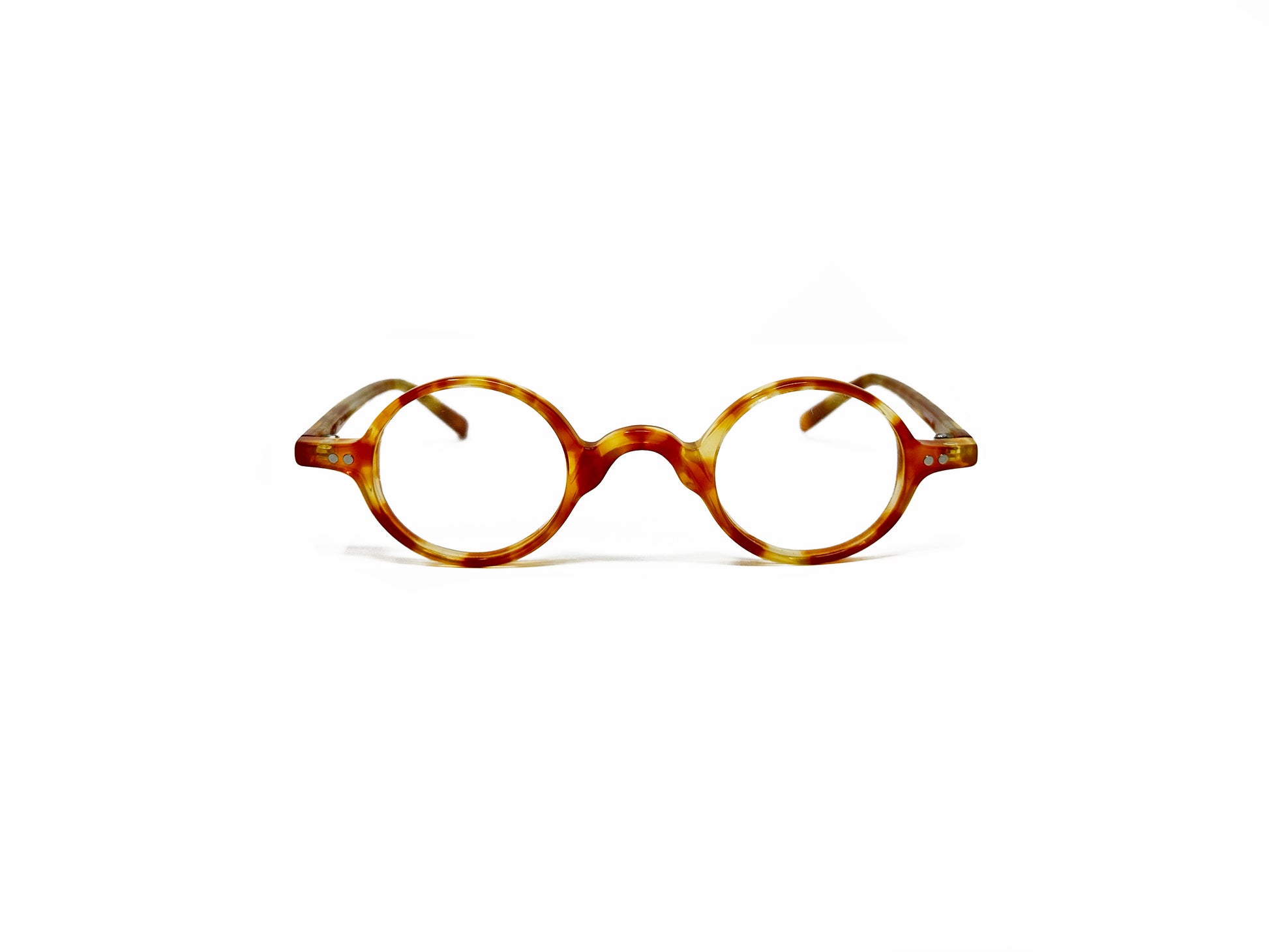 Traction Productions round acetate optical frame. Model: Corbusier. Color: 8 - Light yellow-brown tortoise. Front view. 