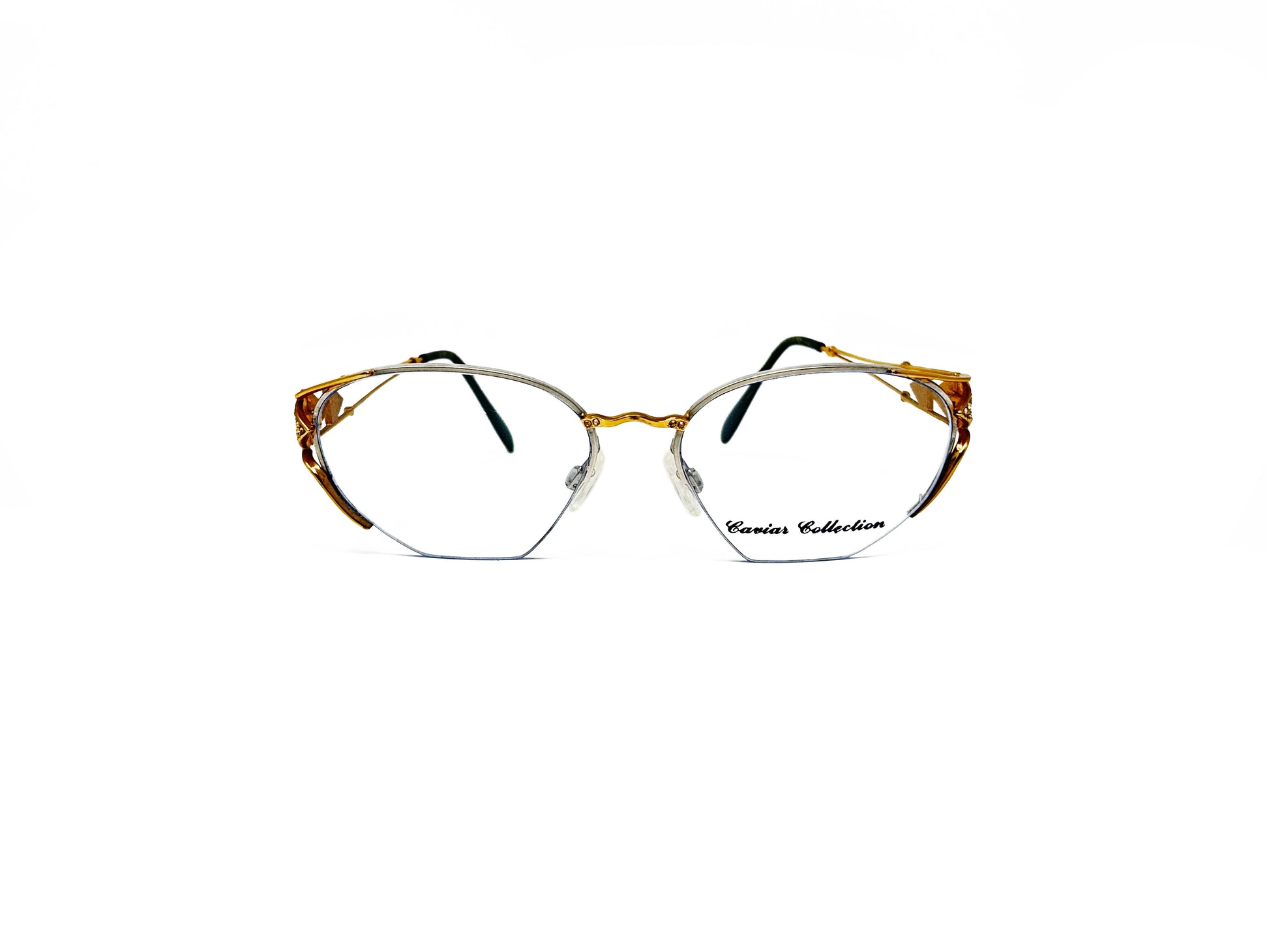 Ultra half-rim optical frame with metal ornate temples and wavy nose bridge. Model: 1893. Color: 25 Gold. Front view. 