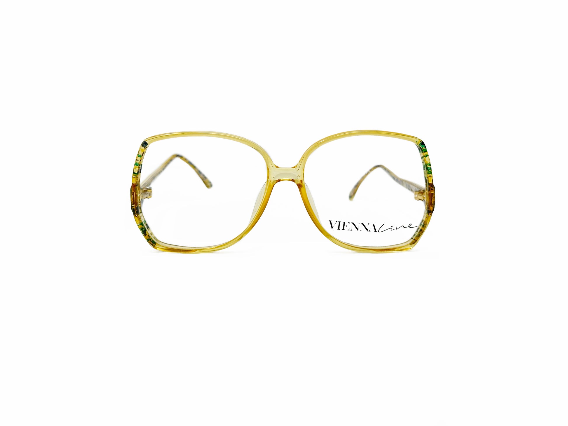 Vienna Cine oversized, acetate, butterfly optical frame. Model: 1563. Color: 60 yellow with green accents. Front view. 