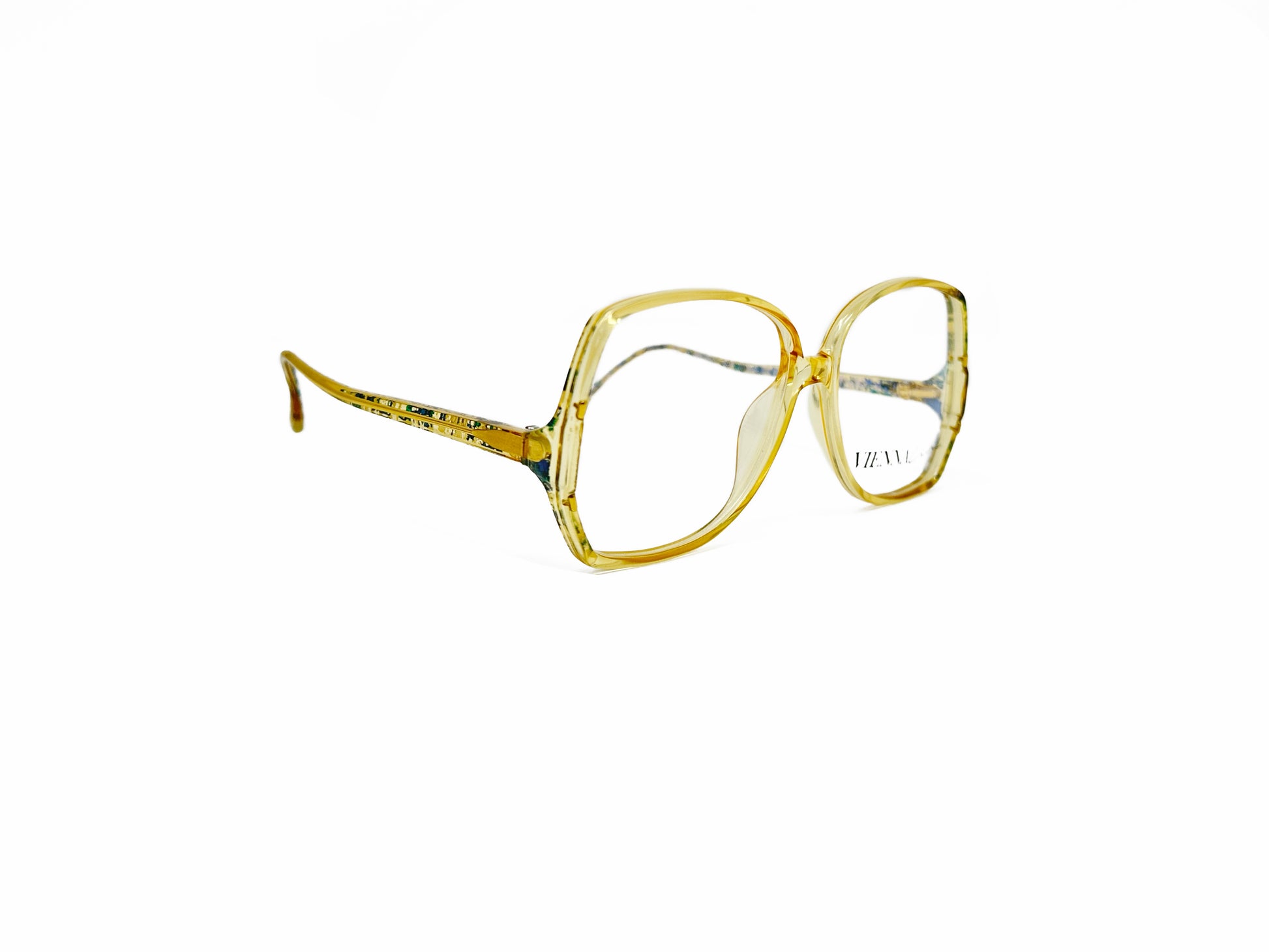 Vienna Cine oversized, acetate, butterfly optical frame. Model: 1563. Color: 60 yellow with green accents. Side view.