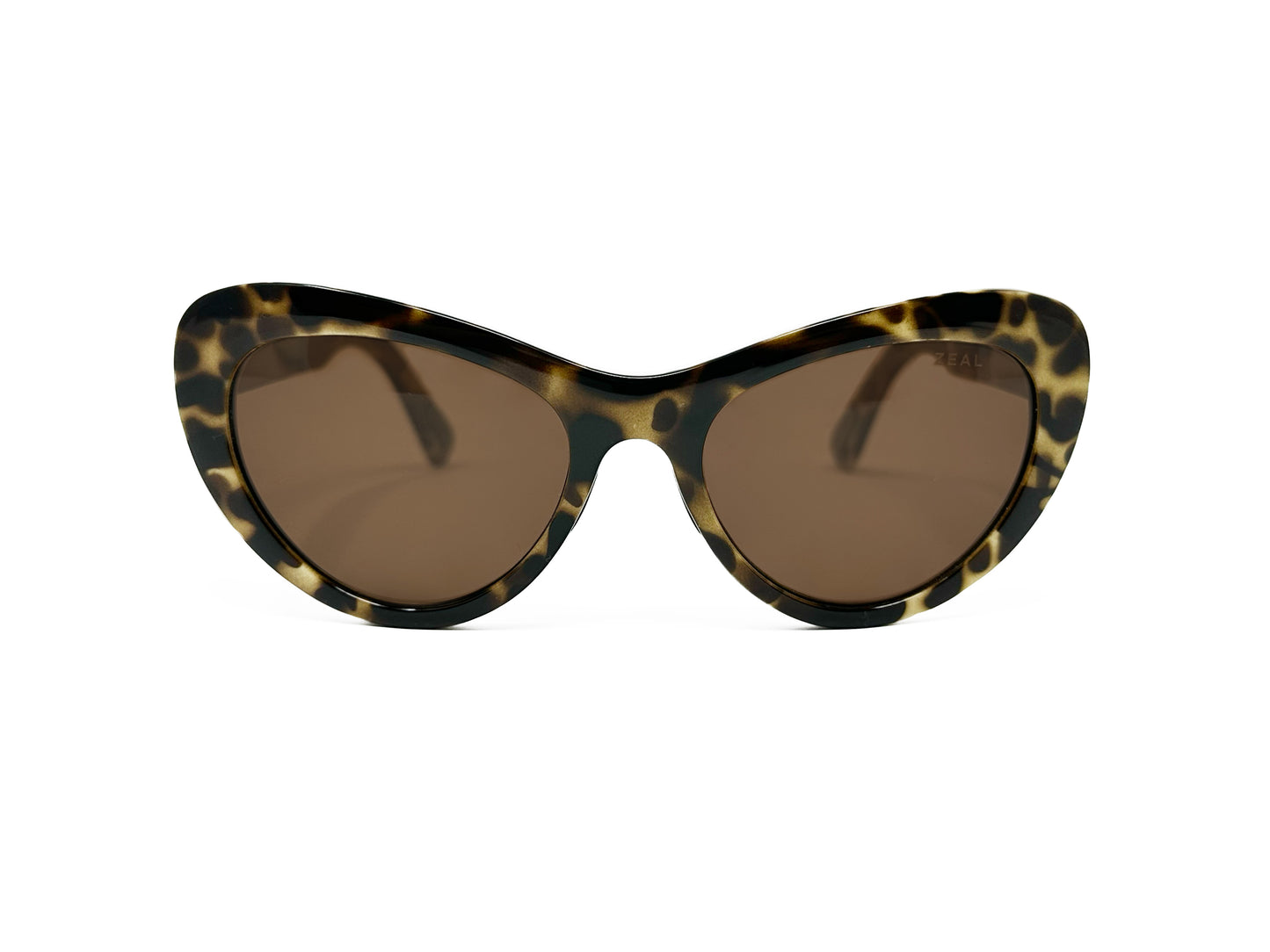 Zeal Optics rounded cat-eye sunglass. Model: Mango. Color: 11683 - Yellow tortoise. Front view. 